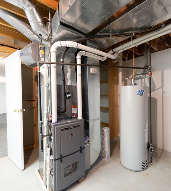 Detroit, Michigan -USA- May 9, 2025: home has been updated with a new furnace and hot water tank installed in the basement
