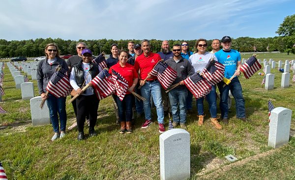 group of holding American flags celebrating veterans